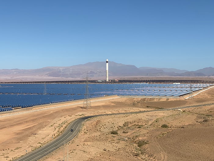 Looking across the parabolic troughs of Noor 2 at the tower of Noor 3